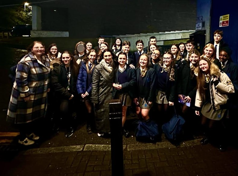 A large group of students smiling for a photo
